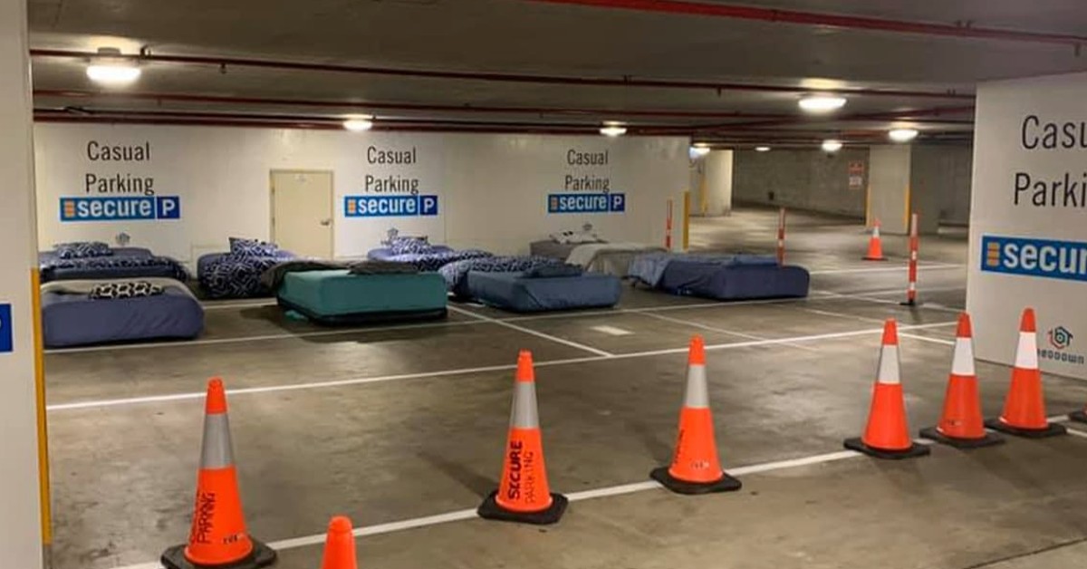 Parking Lot Transforms At Night Becoming A Shelter For The Homeless